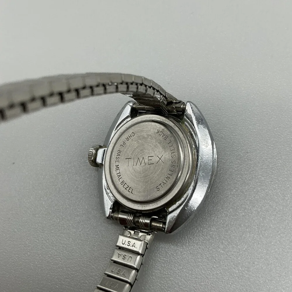 Vintage Timex Womens Watch 28mm Silver Tone Champagne Dial Blue Bezel Manual